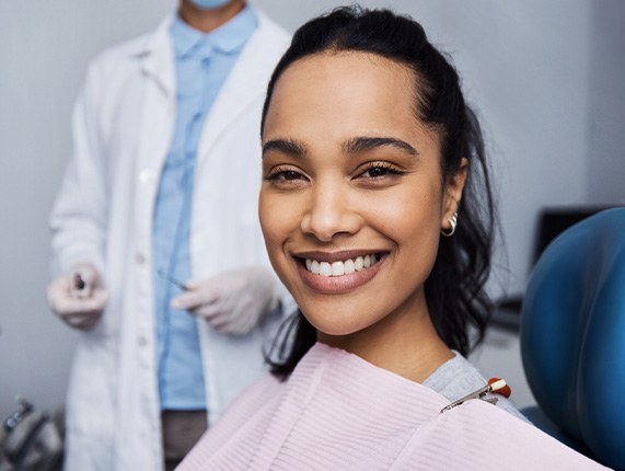 Closeup of patient smiling in treatment chair