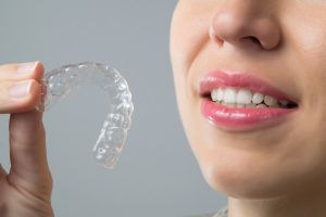 Invisalign in West Orange vs. traditional braces.