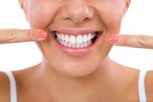 How many times have you had to search, “dentist near me” for help with your porcelain veneers?